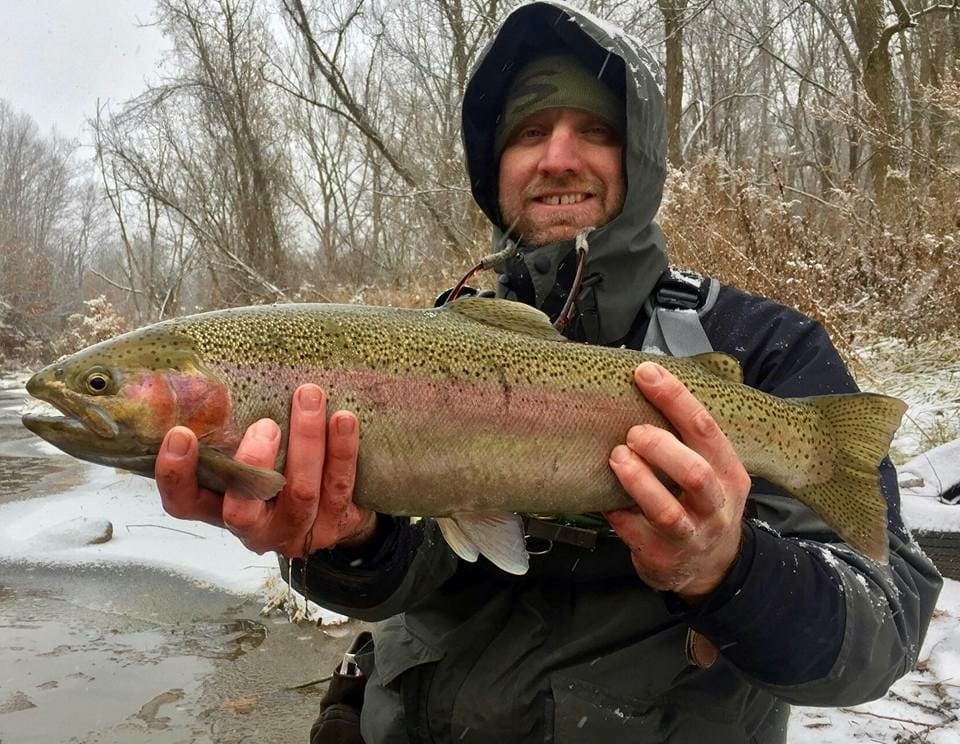 Tony Lohr with his first legit steelhead. He is loving his winter vacation up north from MD. 